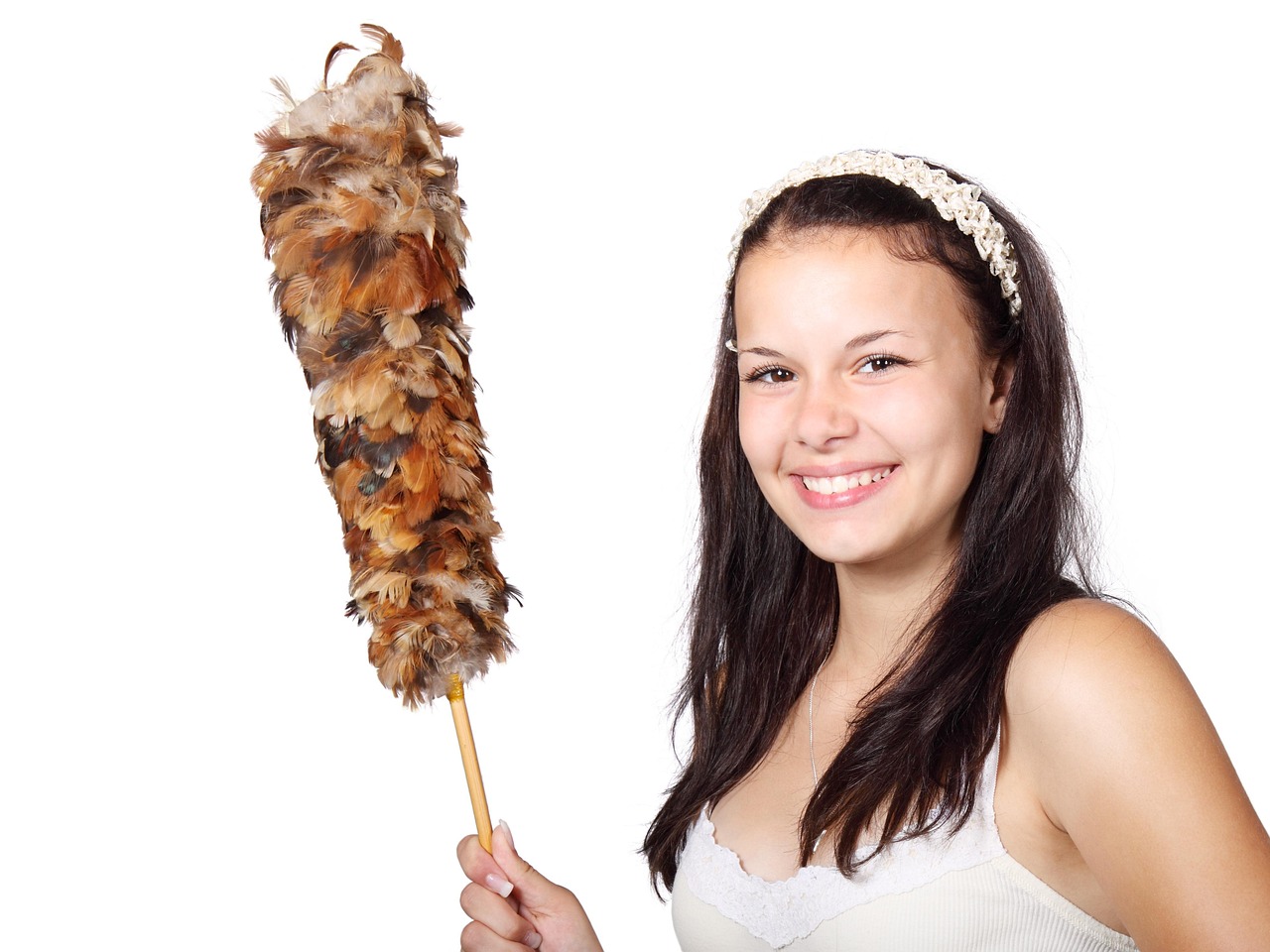 Woman holding a feather duster